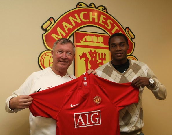 Manucho and Sir Alex Ferguson during his signing for Manchester United
