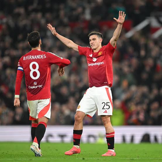 Manuel Ugarte and Bruno Fernandes of Manchester United