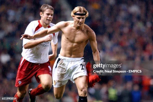 Diego Forlan played shirtless for a few minutes because he was unable to put his shirt back on again for a while..